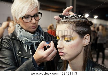 ZAGREB, CROATIA - OCTOBER 17: Fashion model prepares in backstage for Couture show by Marina Design on 'Fashion.hr' show, on October 17, 2012 in Zagreb, Croatia.