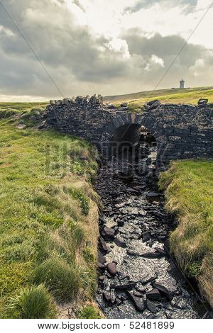 Little ancient bridge over a little ditch