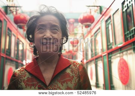 Portrait of senior woman in Chinese traditional clothing