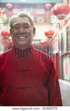 Portrait of senior man in Chinese traditional clothing
