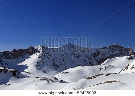 Snowy Mountains And Blue Sky In Morning