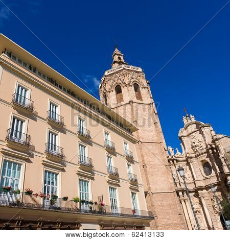 Valencia Cathedral facade and Miguelete Micalet in Plaza de la Reina at Spain