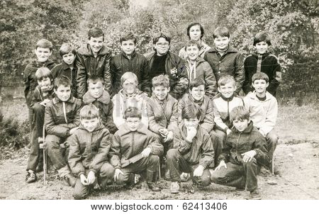 POLAND, CIRCA 1980's: Vintage photo of group of  boys posing together  during a summer camp