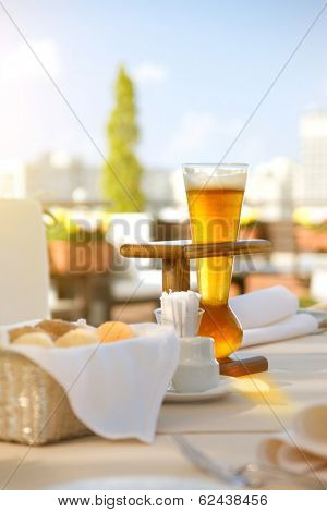 Kwak beer on the served table. Outdoors photo.