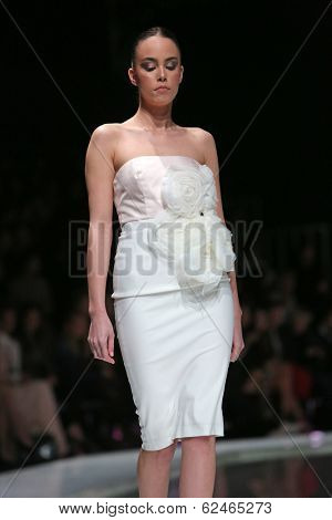 ZAGREB, CROATIA - MARCH 27: Fashion model wearing clothes designed by Mihano Momosa on the 'Fashion.hr' show on March 27, 2014 in Zagreb, Croatia