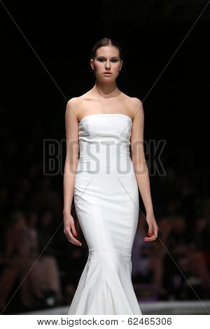 ZAGREB, CROATIA - MARCH 27: Fashion model wearing clothes designed by Mihano Momosa on the 'Fashion.hr' show on March 27, 2014 in Zagreb, Croatia