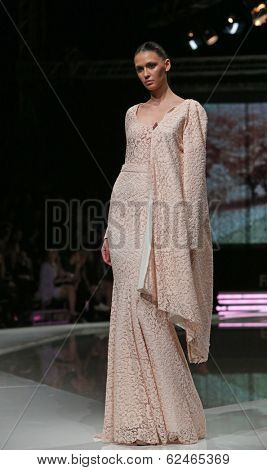 ZAGREB, CROATIA - MARCH 27: Fashion model wearing clothes designed by Mihano Momosa on the 'Fashion.hr' show on March 27, 2014 in Zagreb, Croatia