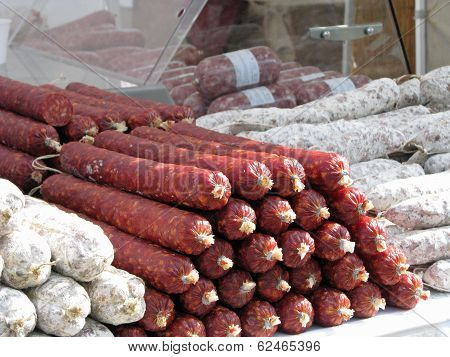 Sausage And Spicy Salami On Sale At A Butcher's Stall
