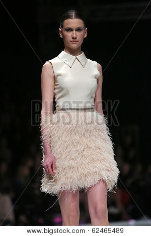ZAGREB, CROATIA - MARCH 27: Fashion model wearing clothes designed by Mihano Momosa on the 'Fashion.hr' show on March 27, 2014 in Zagreb, Croatia