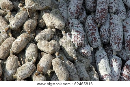 Salami And Italian Sausages Sold In Butcher's Stall At The Market
