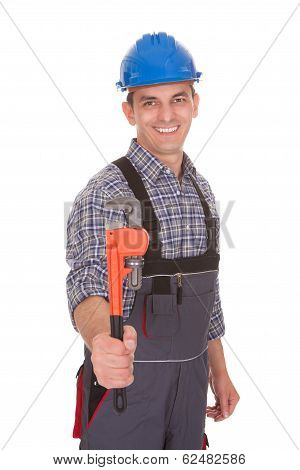 Portrait Of A Male Worker Holding Worktool