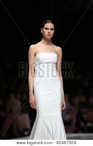 ZAGREB, CROATIA - MARCH 27: Fashion model wearing clothes designed by Mihano Momosa on the 'Fashion.hr' show on March 27, 2014 in Zagreb, Croatia