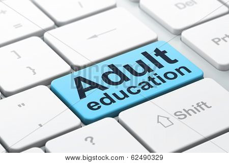 Education concept: Adult Education on computer keyboard background