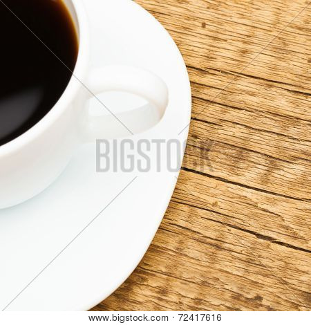 Close Up Of White Ceramic Coffee Cup On Wooden Table - Studio Shoot
