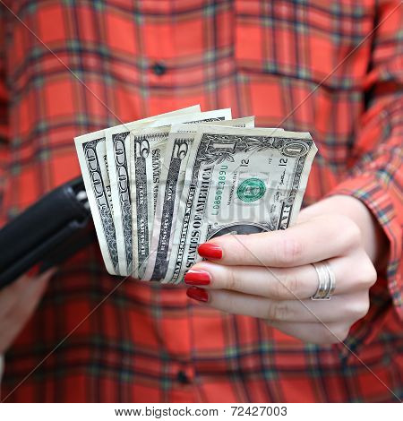 Money in woman's hand