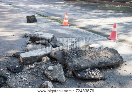 Road repairing works. destroyed asphalt,