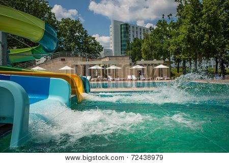 person riding down a water slide