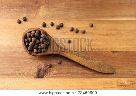 Wooden spoon with allspice