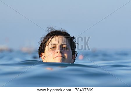 Swimmer Shead Above Water
