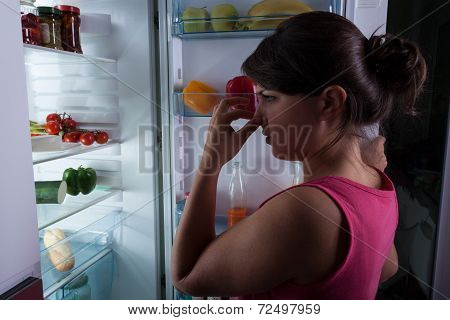 Woman Holding Nose