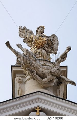 GRAZ, AUSTRIA - JANUARY 10, 2015: The Fall of the Angels, portal of Mariahilf church in Graz, Styria, Austria on January 10, 2015.
