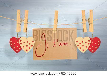 Valentines love hearts against bleached wooden planks background