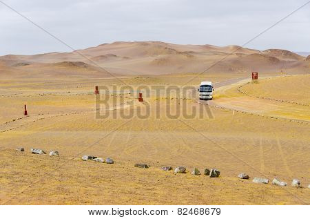 PARACAS, PERU, MAY 22, 2014: Touristic bus arrives at 