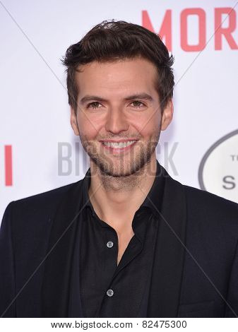 LOS ANGELES - JAN 21:  Guy Burnet arrives to the 