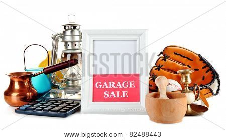 Unwanted things ready for a garage sale, isolated on white