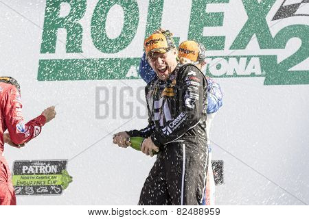 Daytona Beach, FL - Jan 25, 2015:  The Chip Ganasi Racing with Felix Sabetes Riley DP crew celebrates after winning the Rolex 24 at Daytona International Speedway in Daytona Beach, FL.