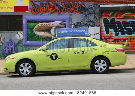 New green-colored Boro taxi in Astoria section of Queens