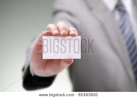 Businessman showing his business card
