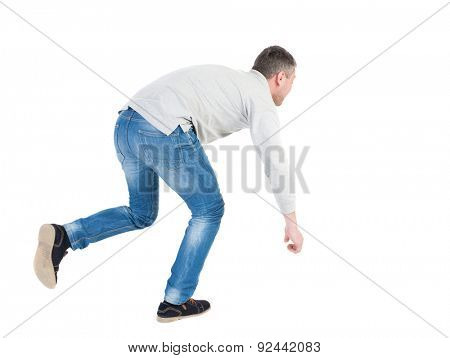 Balancing young man or dodge falling man. Rear view people collection.  backside view of person.  Isolated over white background. Man blows the wind. Running man stumbled, trying not to fall.