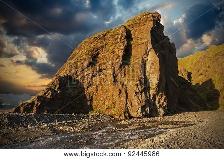 Midnight setting sun lits beautifully volcanic rocks at Thorsmork, Iceland