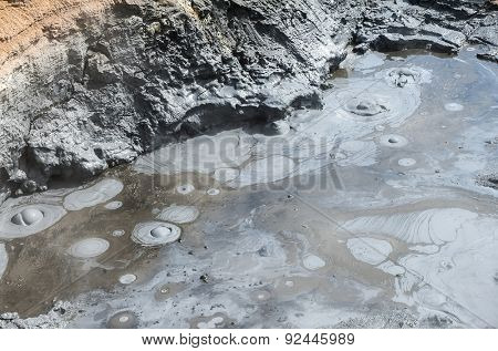 Hot boiling mud at fumarole is bubbling and exploding at mudpots, Hverir - Icelnad. When photographed at high speed nice sculptures could be seen