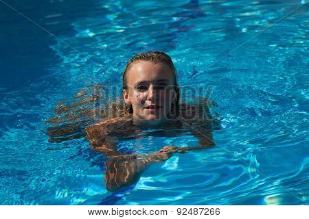 Sexy Girl In Bikini Swimms In Swimming Pool.