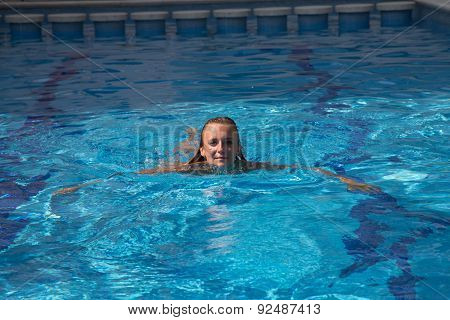Sexy Girl In Bikini Swimms In Swimming Pool.