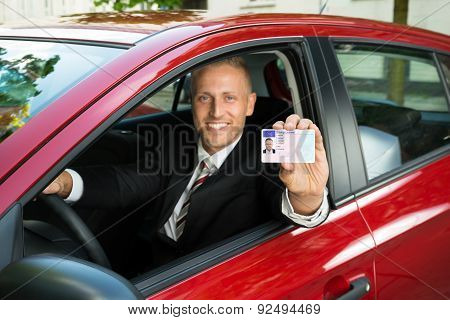 Businessman Showing His Driving License