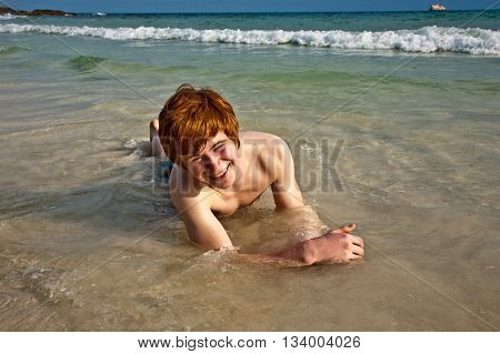 Cute Boy Enjoying The Beac