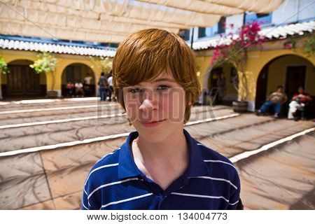 Cute Boy In The Old Olvera Mission
