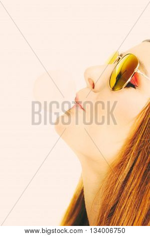 Funky Girl Blowing Balloon.