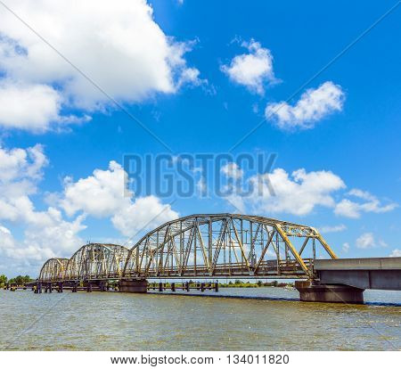 Old Bridge In East Area Of New Orleans Crossing The Bay