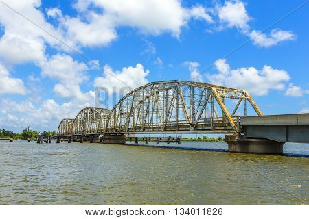 Old Bridge In East Area Of New Orleans Crossing The Bay