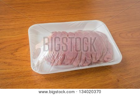 Fresh chitterlings on wood table