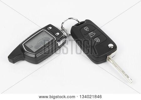 Key with radio remote panel trinket isolated over white backround