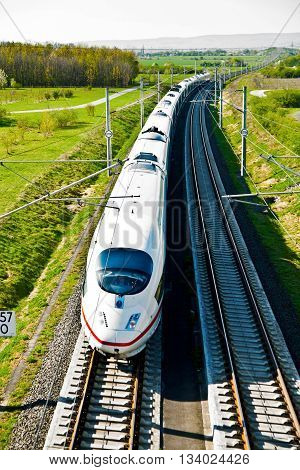 RAUNHEIM, GERMANY - June 3, 2011: high speed train with full speed in landscape
