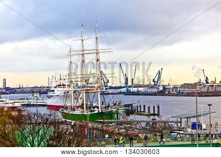 HAMBURG, GERMANY - JUNE 3, 2011: old sailor on pier of Landungsbruecken in Hamburg