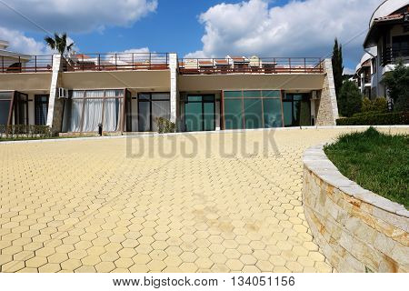 St.Vlas NESSEBAR BULGARIA - MAY 06 2011: Villas with big windows and blue sky on the St.Vlas coast of Black Sea Sunny Beach Bulgaria.