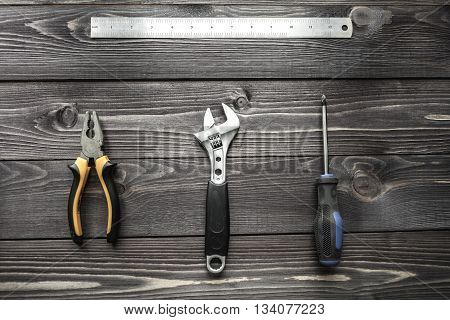 Tools On The Wooden Rustic Background