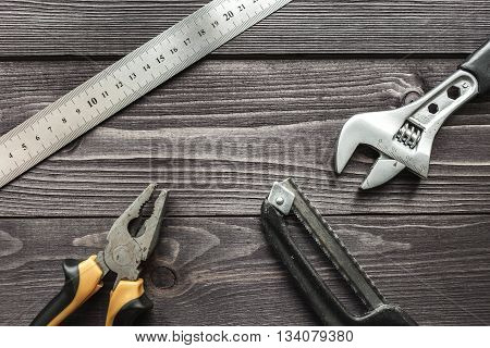 Tools On The Wooden Rustic Background